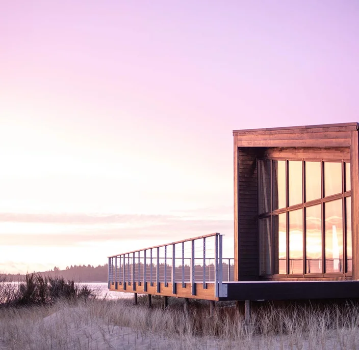 Considering a  Coastal Getaway for Your Birthday? Here’s a Modern Cabin You’ll Love